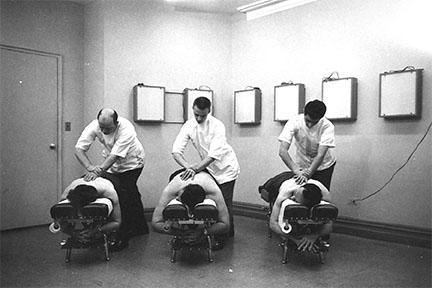 Chiropractors adjusting in 1920 at the Columbia Institute of Chiropractic