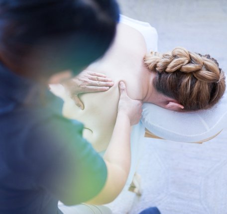 a patient receiving a massage