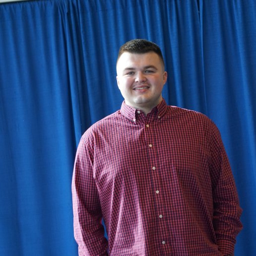 Conner Buttry smiling for a photo