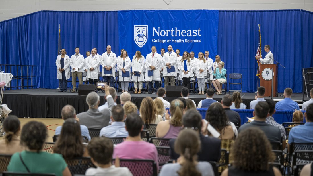 Faculty members stand to be recognized