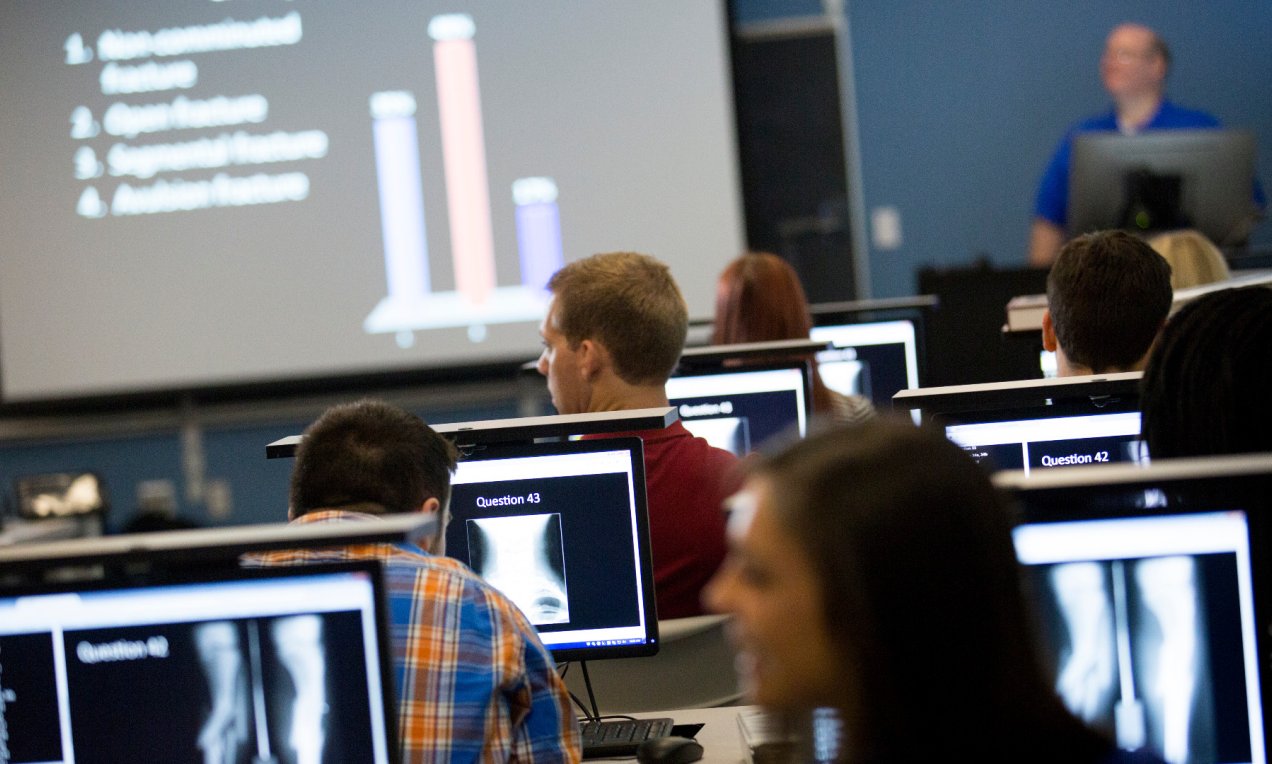A group of people in lecture
