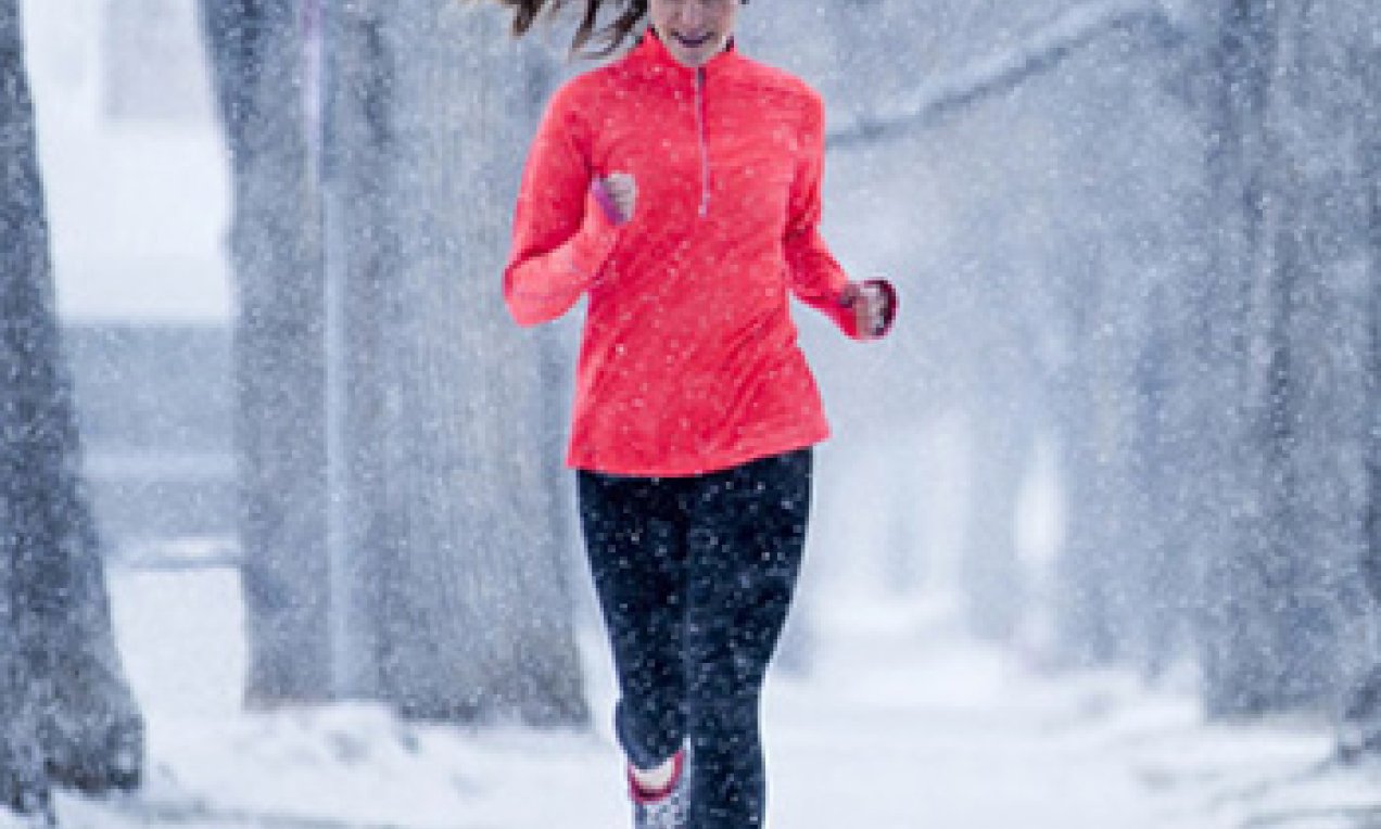 A woman running in snow