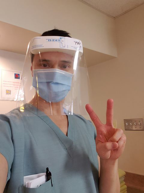 Dr. Viet Nguyen with a protective mask headshot