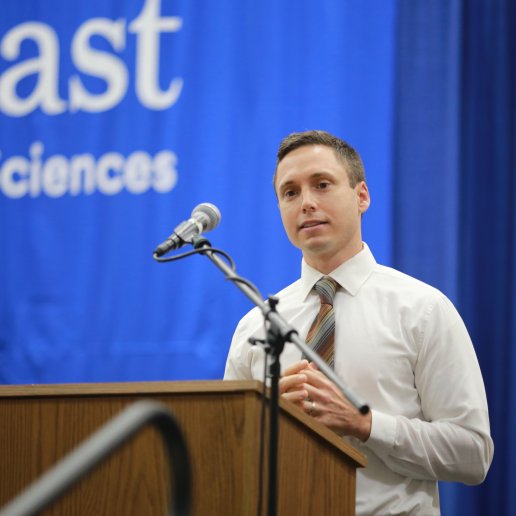 Dr. Barker delivering an address