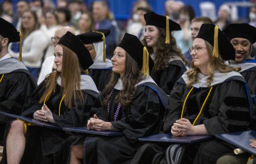 A group of students sitting during commencement